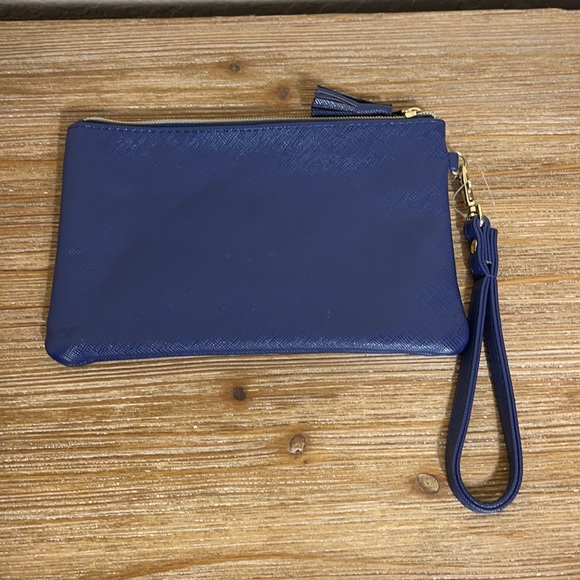 Handbags - NWOT Navy Wristlet clutch with tassel